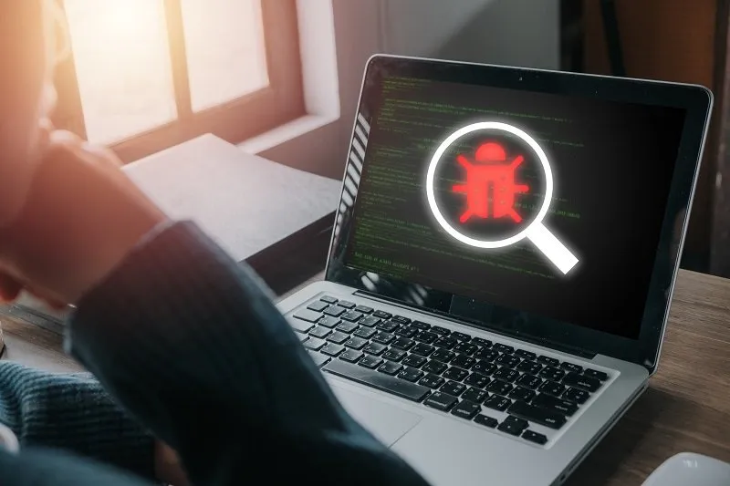 Software development and debugging concept, Person hand using la