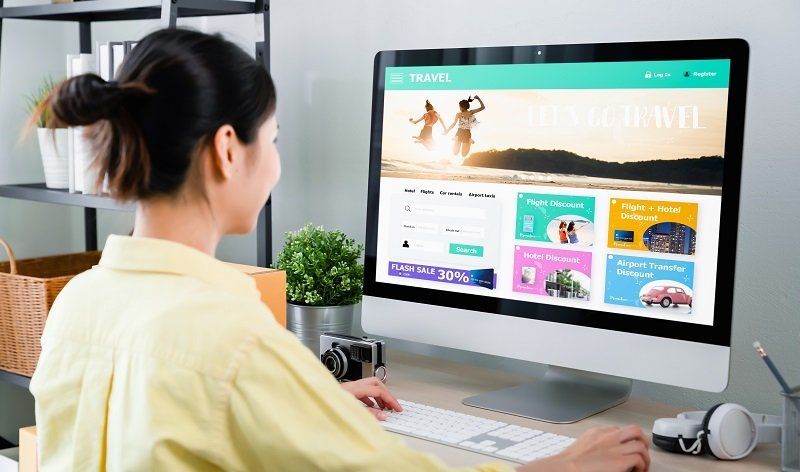 Woman using application booking flight travel search ticket holiday and hotel on website discounted price, concept technology online marketing.